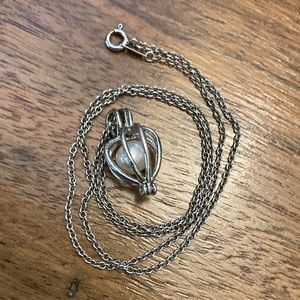 Pearl In Cage Pendant